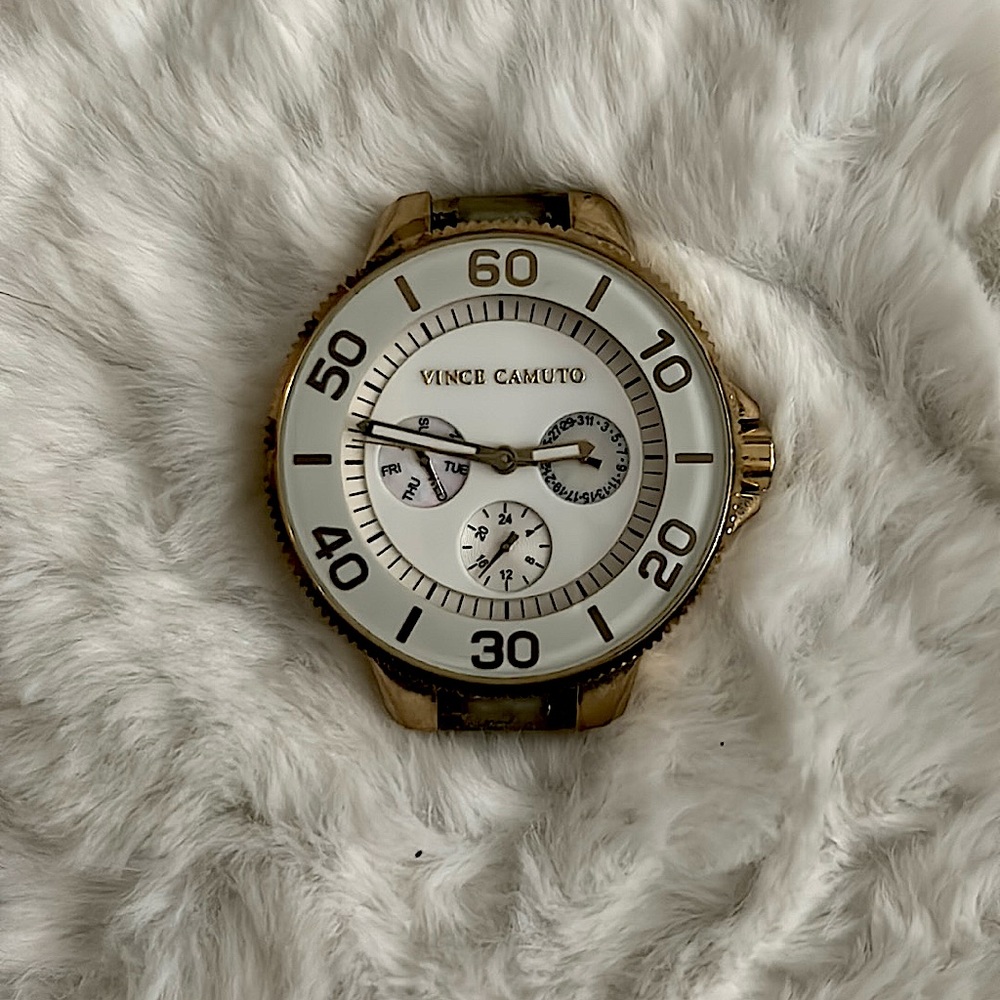 Vincent Camuto white watch face - stainless steel back - water resistant 100ft.